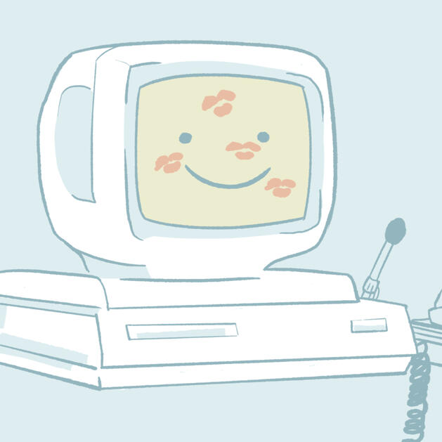 a picture of a computer with a smiley face on its monitor, which is also covered in kiss marks